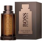 Hugo Boss BOSS The Scent Absolute for Men Eau de Parfum, presented in a sleek dark amber glass bottle with a metallic cap.