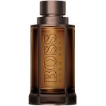 Hugo Boss BOSS The Scent Absolute men's Eau de Parfum in a sleek, amber-colored glass bottle with a dark cap.