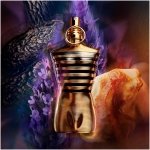 Jean Paul Gaultier Le Male Elixir men's fragrance, gold torso bottle with dark stripes.