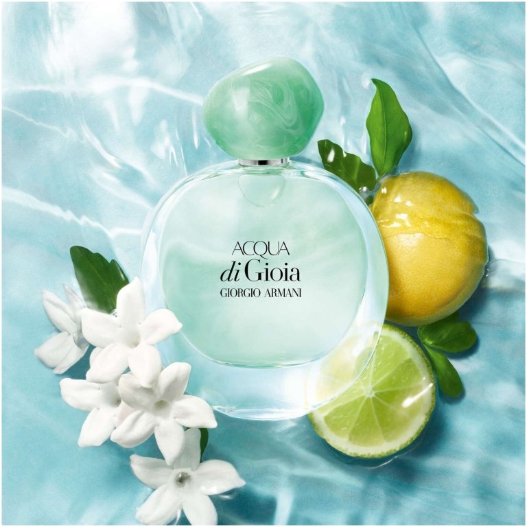 Giorgio Armani Acqua di Gioia Eau de Parfum in a clear, organically shaped glass bottle with an emerald green cap and light green liquid, representing its fresh, aquatic, citrus-jasmine scent.